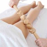 Rouleau de massage en bois pour soulagement des douleurs musculaires